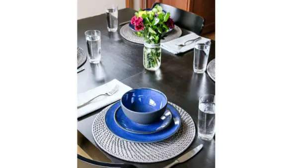 A ceramic, handmade dinnerware set.