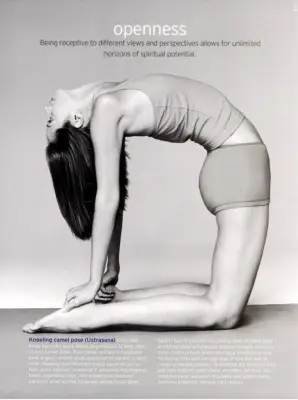 Christy Turlington on a yoga mat practicing Camel Pose