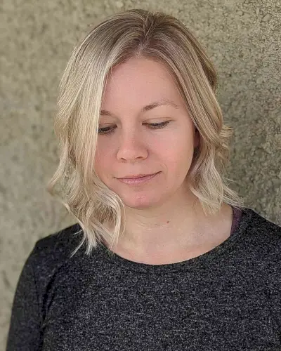 Asymmetric Cut for Thin Hair with an Ash Blonde Color