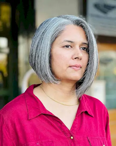 Fresh and Short Asymmetric Bob for ladies with silver hair