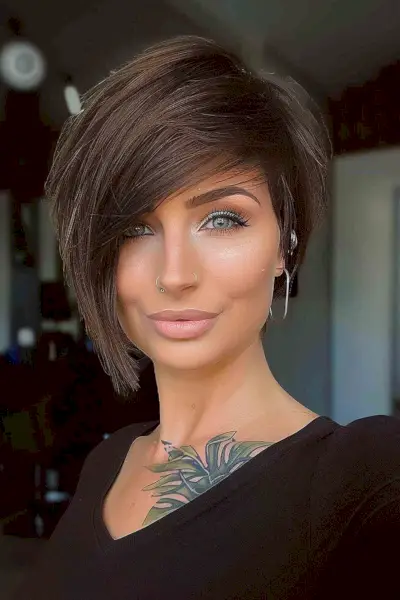 face-framing asymmetrical bob with bangs