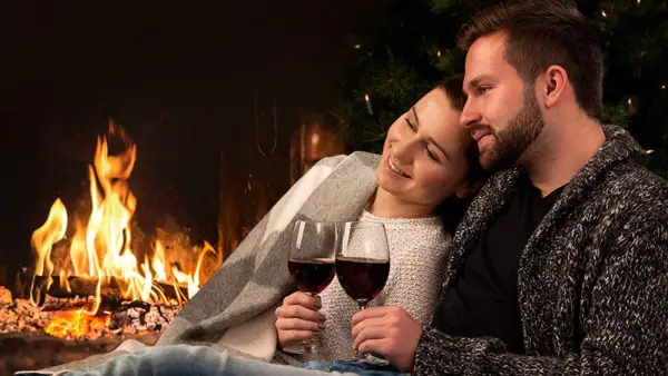 couple with fire and wine