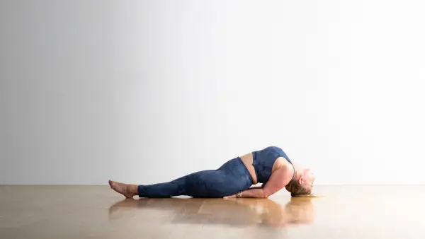 Woman in One-Legged King Pigeon Pose