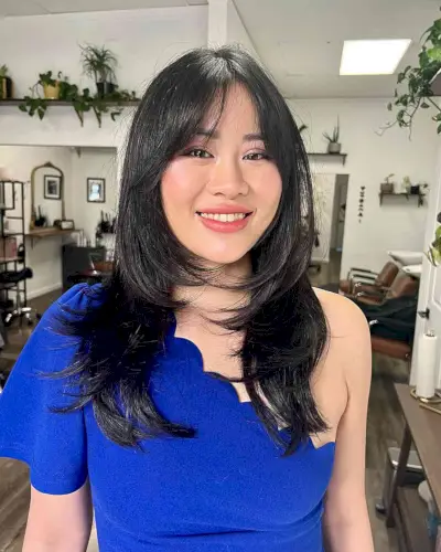 Long Layers and Curtain Bangs for Round Faces with layers for mid-length hair