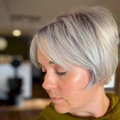 Cute Pixie Bob with Middle-Part Bangs for Women with Chubby Cheeks