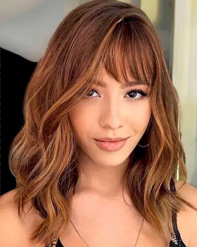 Tousled Mid-Length Cut with Subtly Swept Bangs for women with fine hair