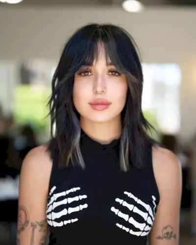 Stylish and Sultry Long Bangs for Mid-Length Hair