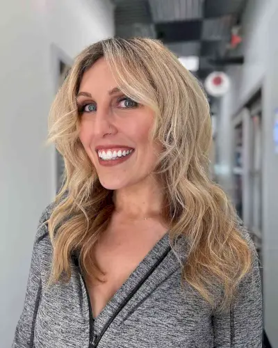 Textured Blonde Hair with Curtain Bangs