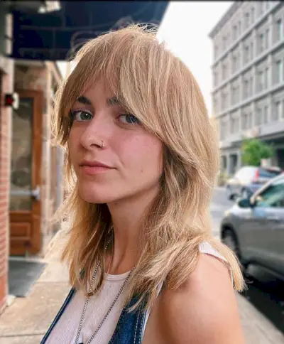 Polished bronde shag for medium hair with bangs