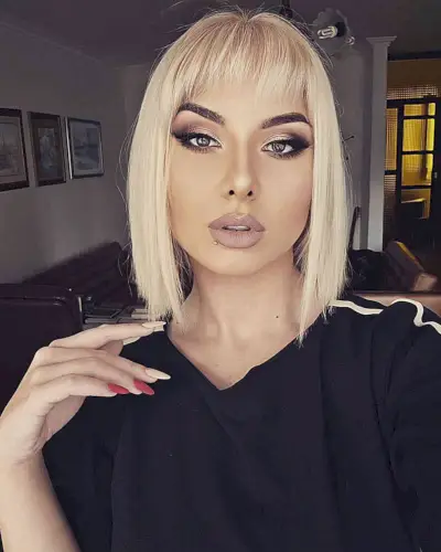 Short and Thin Bangs for women with thinner hair cut at neck length