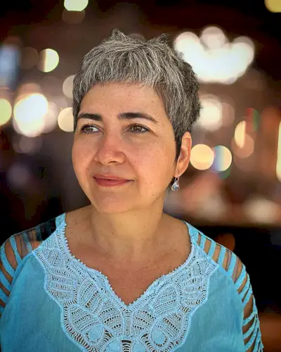 The Cutest Salt and Pepper Pixie with Short Fringe for older ladies with short hair