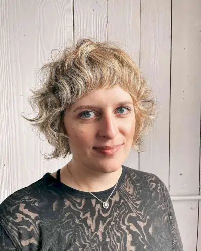 curly hair with short bangs