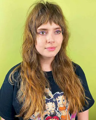 Long Wavy Layers with Choppy Bangs