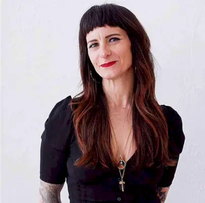 Long Layered Hair with Short Uneven Bangs for ladies with an edgy style