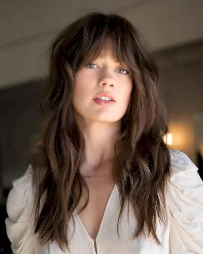 Face-framing bangs for a square face