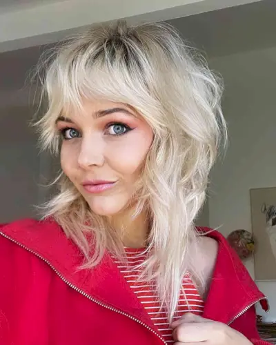 Bright Blonde Messy Shag for Thin Haired Ladies with bangs and lots of layers