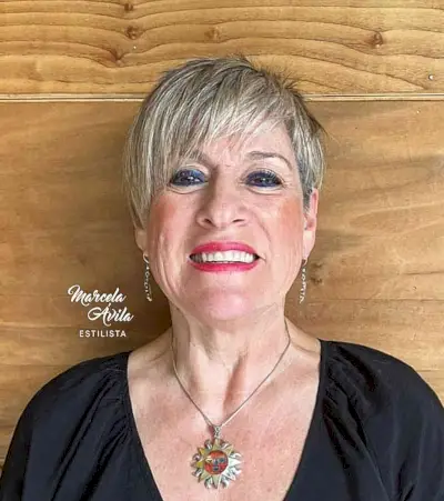 Dirty Blonde Pixie Cut with Sweeping Fringe for older women with thin hair