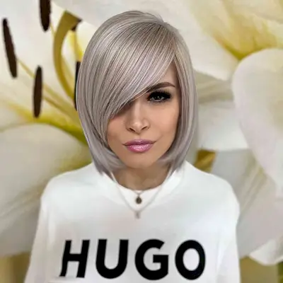 Straight Bob with a Deep Side Part and Side-Swept Bangs for women in their 30s with short hair