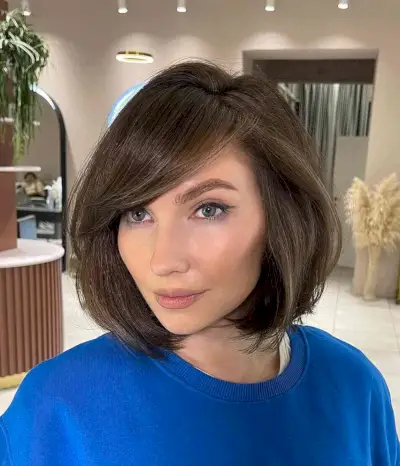 Deeply Parted Bob with Side-Swept Fringe
