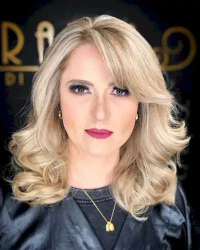 Side swept style for thick bangs