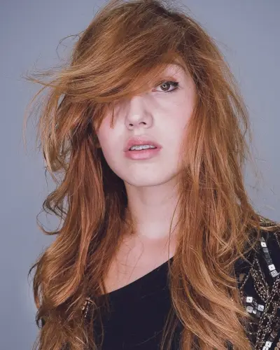 Elegant Side-Swept Bangs for Long Hair