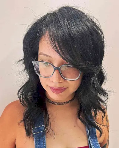 Long Side Bangs and Medium Layers Hawaiian Hairstyle