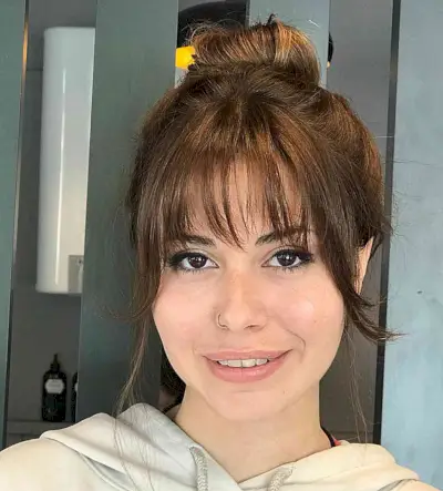 Bun Updo with waterfall Bottleneck Bangs