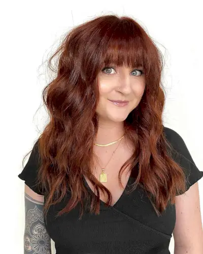 fiery long hair with full bangs
