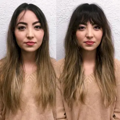 layered haircut with wavy bangs on long hair