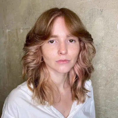 ‘70s Shag Haircut with Swoopy Bangs