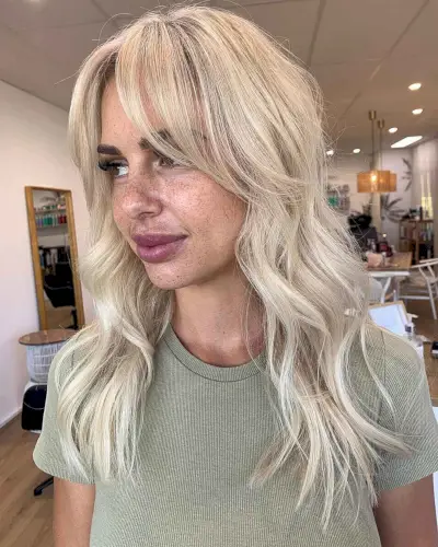 Long Curtain Fringe on Wavy, Blonde Hair