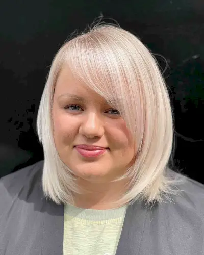 Long Side Bangs with Front Layers for Round Faces