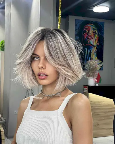 Straight Bob with Platinum Balayage and Bangs