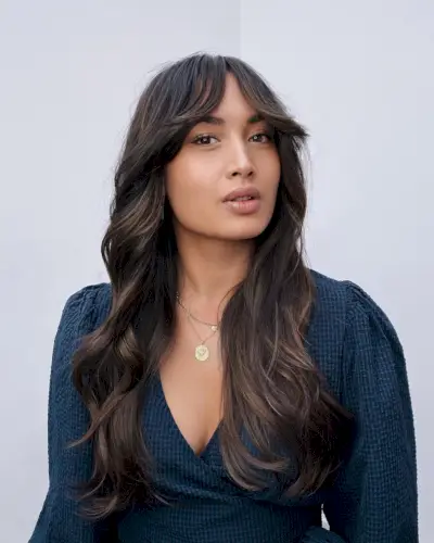 Chic Curtain bangs for wavy hair