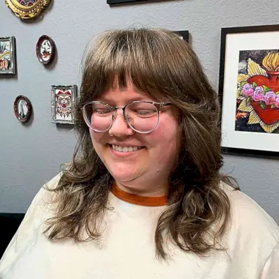 Mid-Length Brunette Shag with Light Bangs for Plus Size Women