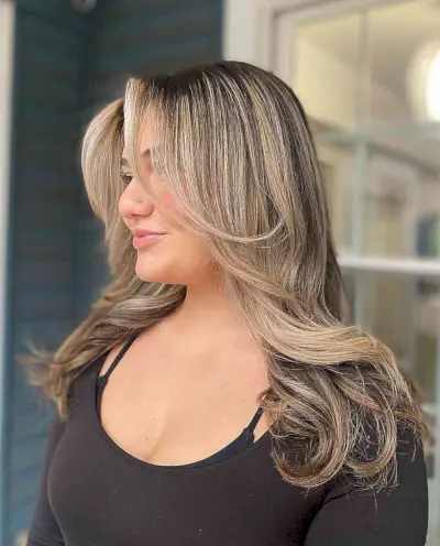 Long Bangs and Layers Hairstyle for Rounded Face