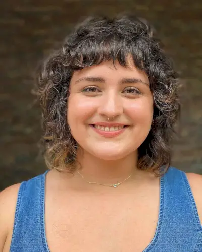 Effortless curly mullet with short bangs