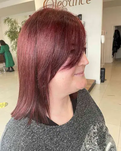 Sleek Shoulder-Length Cut with Blunt Ends and Long Side Fringe for Straighter Locks