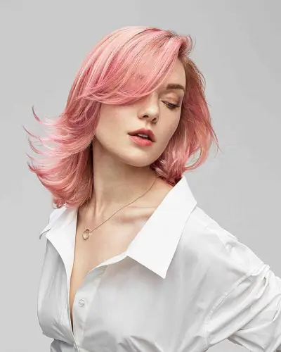 Pink Layered Cut with Side Bangs and Feathered Ends for Shoulder-Length Hair