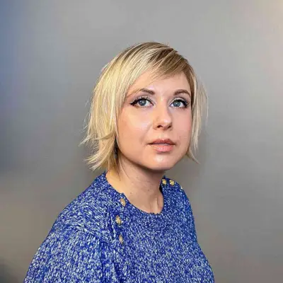 Short Blonde Bob with Choppy Side Bangs and Layers on Thin Hair