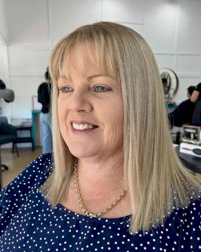 Medium-Length Blonde Hair with Wispy Fringe