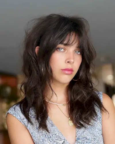 mid-length cut with wispy bangs