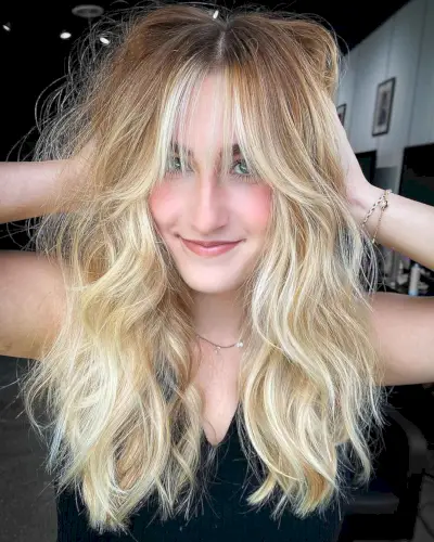 Long Blonde Hair with Wispy Curtain Bangs