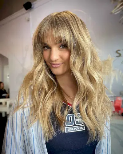 Wispy Bangs and Wavy Long Layers