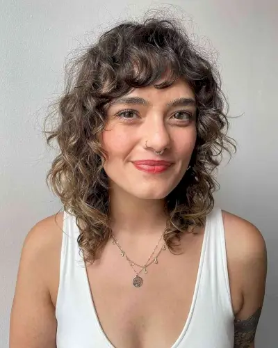 Modern Curly Shag with Fun Bangs