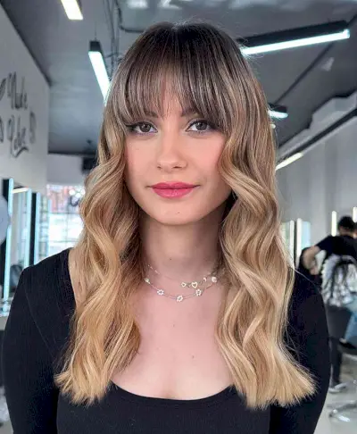 Choppy Bangs on Long Ombre Hair and women with an edgy style