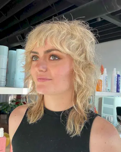 Shoulder-Length Wolf Cut with a Fringe for Textured, Thin Hair