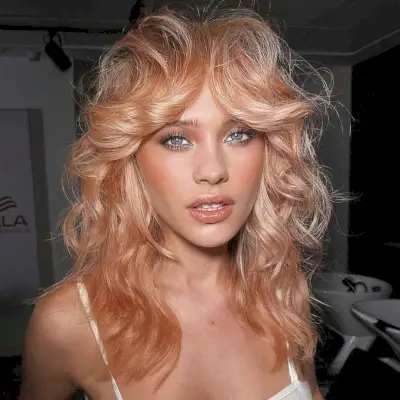 Voluminous Curtain Bangs on Shaggy Wolf Hair