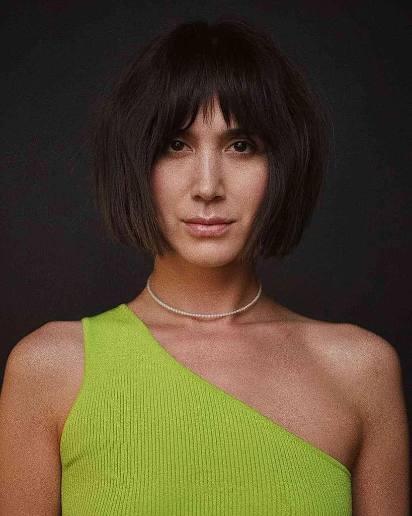 Moderne bob met schokkerige pony' title=