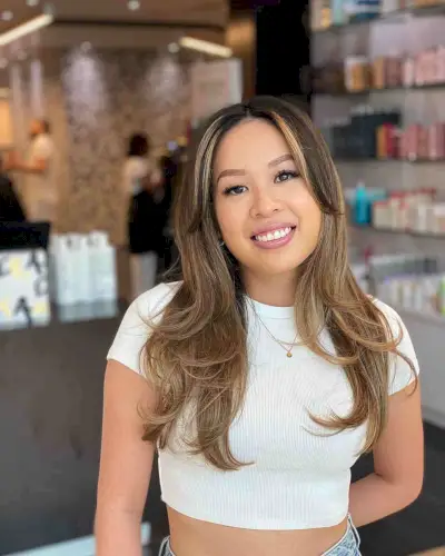 Long Blowout Straight Hairstyle with Long Curtain Bangs